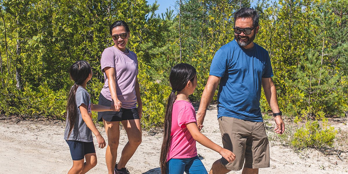 A family walking on the beach