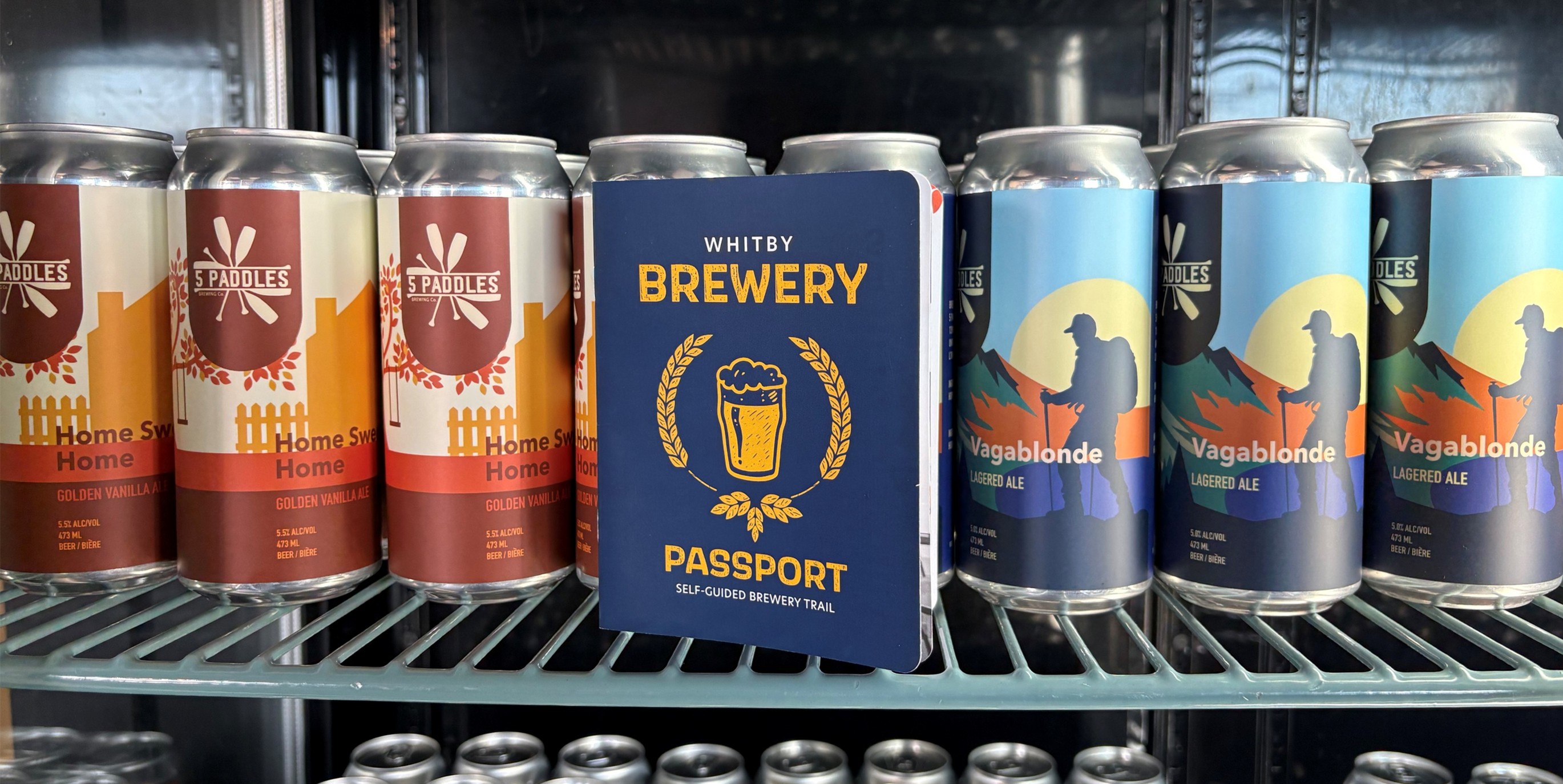 Brewery Passport inside fridge with beer cans